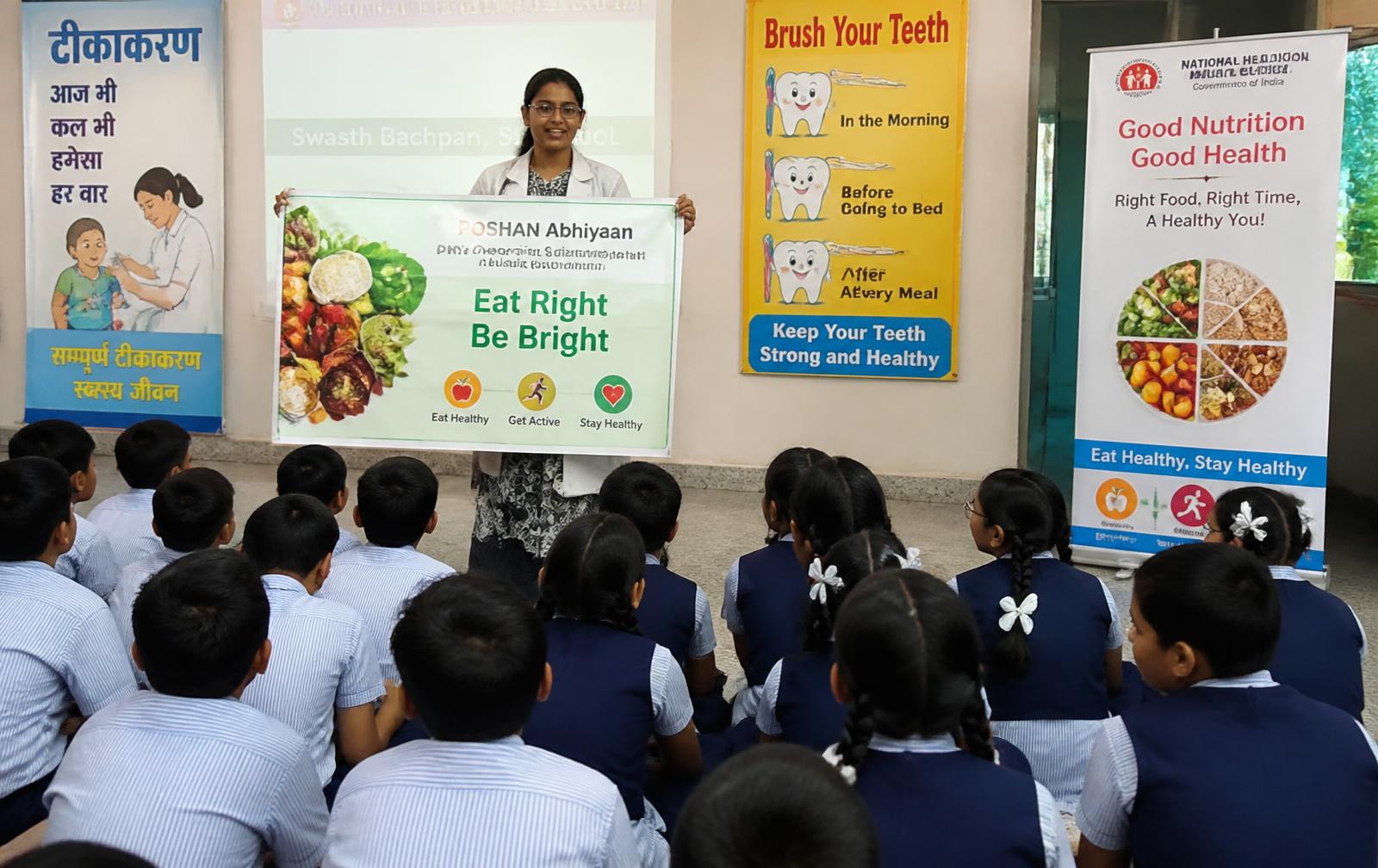 Health awareness session on nutrition, vaccination and oral care in a school hall